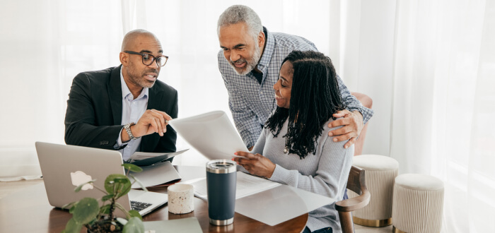 Couple talks to lawyer about estate planning