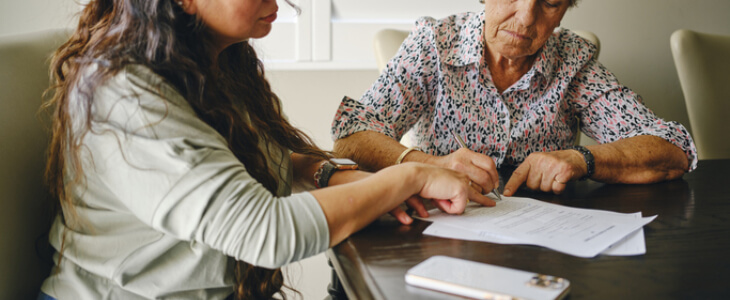 Elder woman taking care of documents