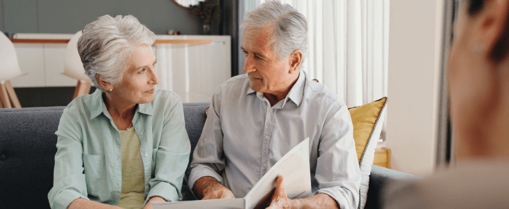 Elder couple discussing their estate plan with their lawyer